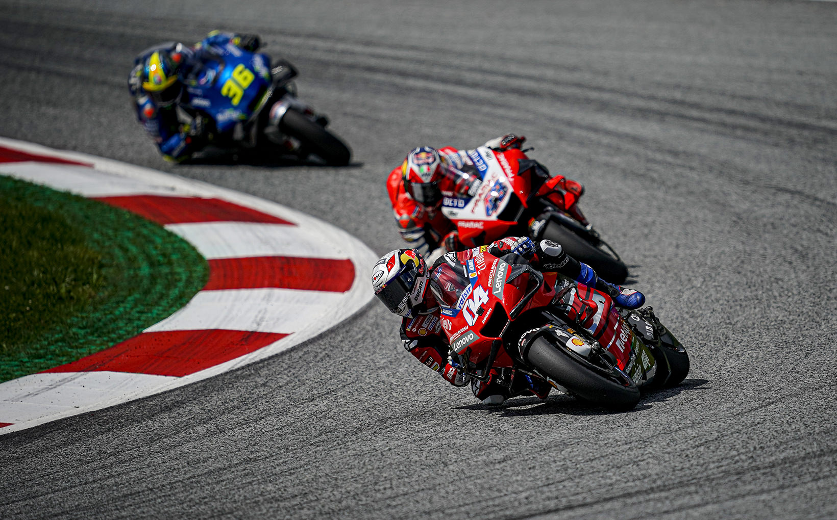 Andrea Dovizioso quits Ducati yet wins in Austria as Valentino Rossi & Maverick Vinales came within inches of being hit by Two MotoGP Machines.