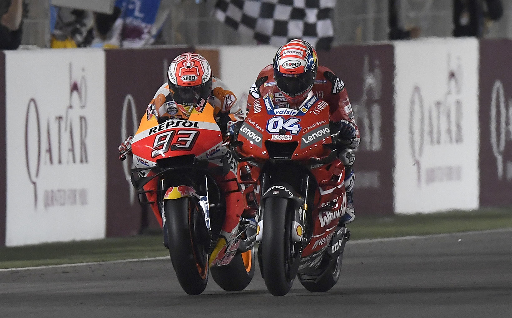 DesmoDovi takes the flag just 0.023 seconds ahead of Marquez and Crutchlow